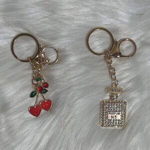 New Set of 2 Perfume and Cherry Keychains